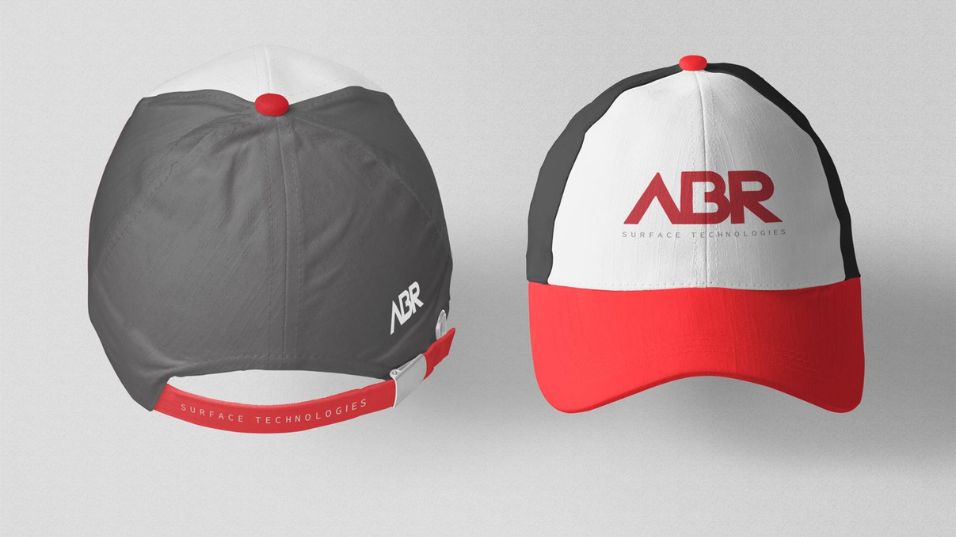 Diseño de gorras de ABR, trabajo de rebranding de IDEADE Creativos