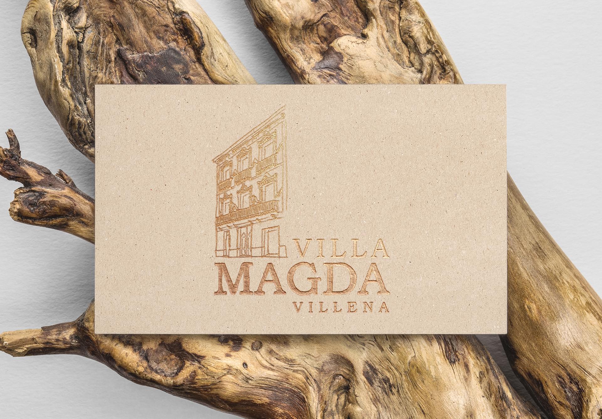 diseño branding y logotipo villa magda villena aplicado en tarjeta con termograbado oro